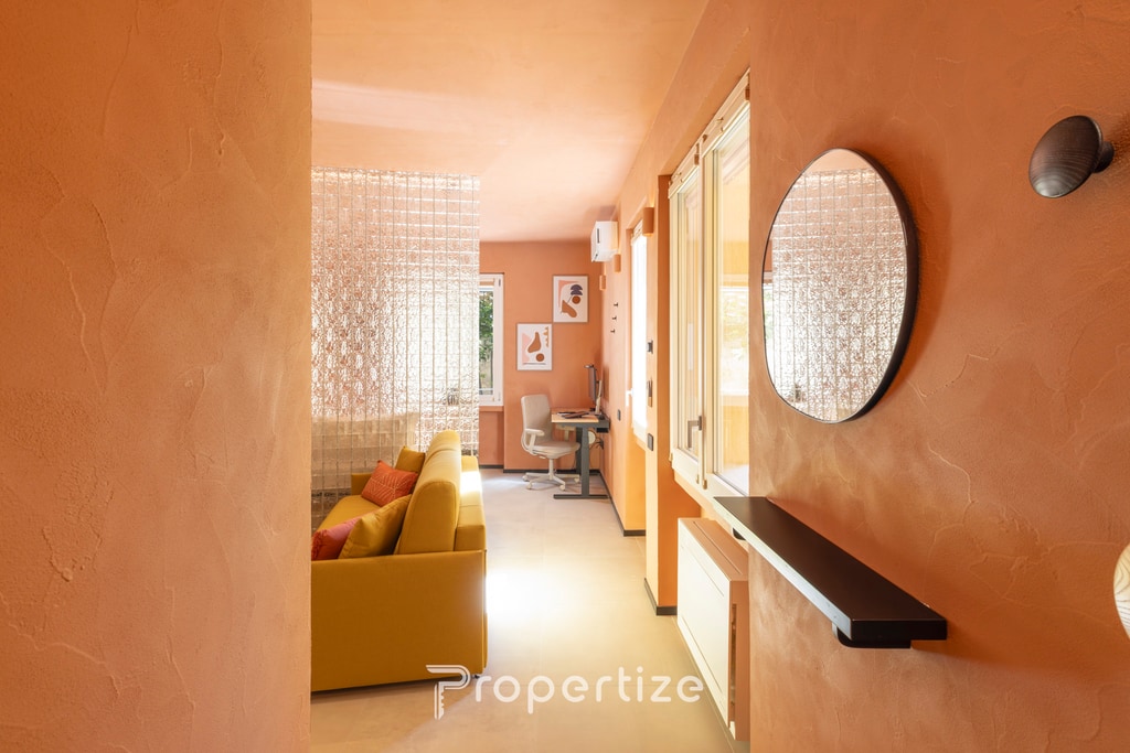 Terra & Vidru Studio — living room with yellow sofa, Stampace, Cagliari